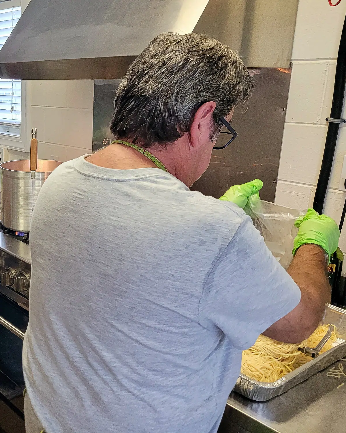 Ron Kelly keeping an eye on the pasta while cooking at the Spaghetti Dinner